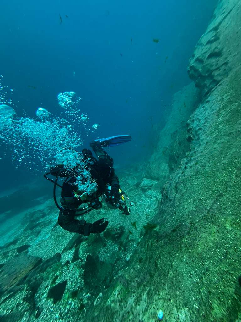 Scuba diver exploring Albanian underwater reefs